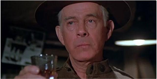 A serious Colonel Potter, giving orders with his signature sense of responsibility, ready to face whatever challenges come his way at the 4077th